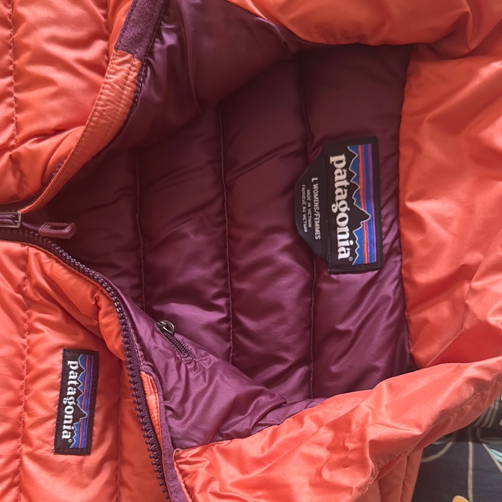 Patagonia women’s orange Nano Puff Vest Excellent like new size large